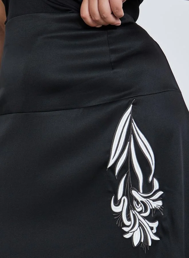 ستايلي تنورة بنقشة زهور مقاسات كبيرة